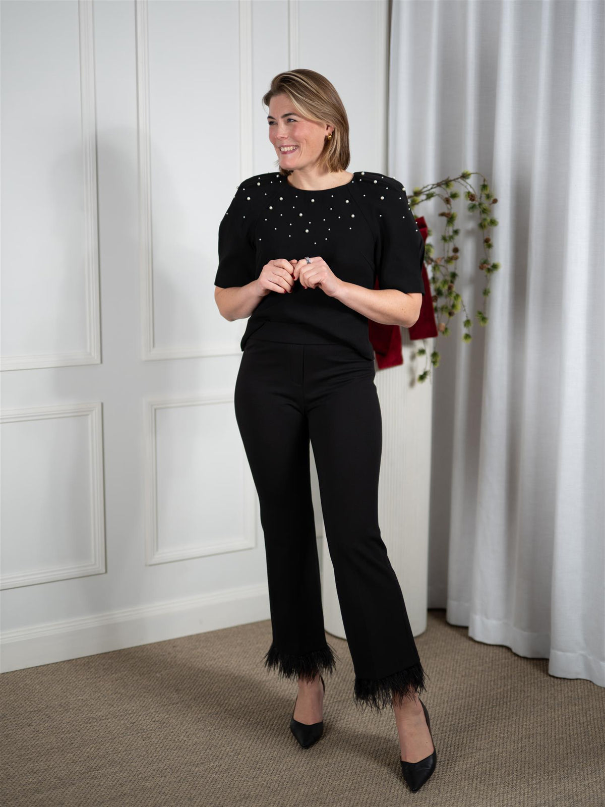 Nanette Feather Black